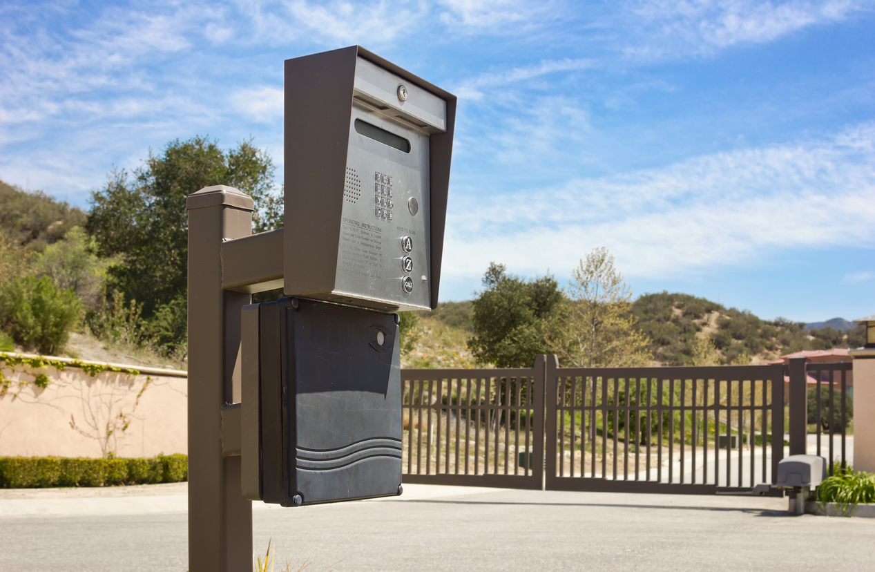 Secure gated community entrance keypad and private road in North Scottsdale